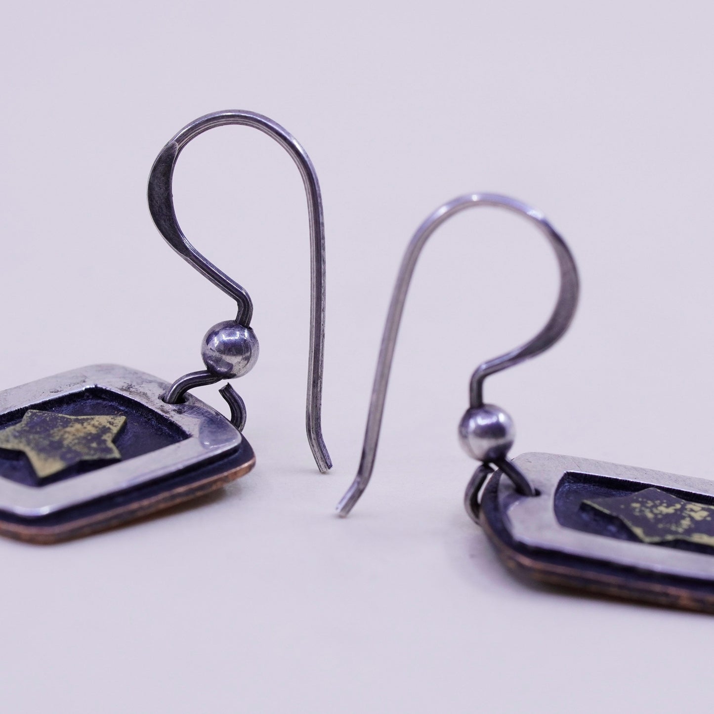 Vintage sterling silver handmade earrings, 925 tag with brass star