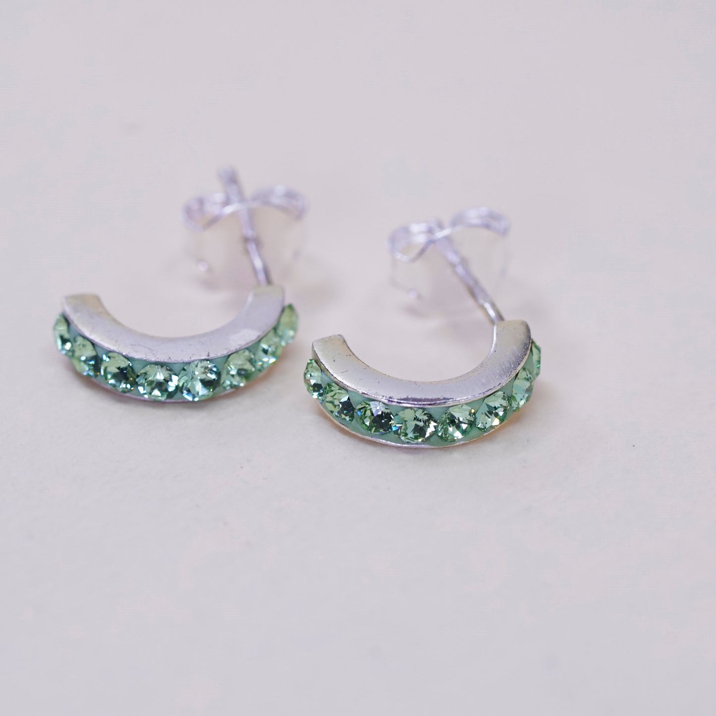 Vintage Sterling silver handmade earrings, 925 Huggie studs with green Cz
