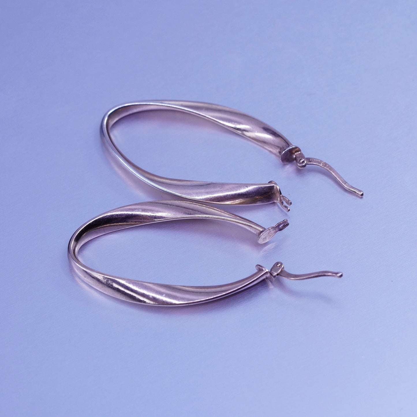 1.25”, vermeil rose gold Sterling silver handmade earrings, 925 twisted hoops
