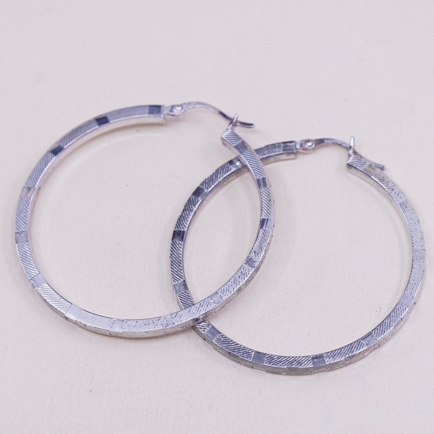 1.75”, vtg sterling silver loop earrings, textured minimalist primitive hoops
