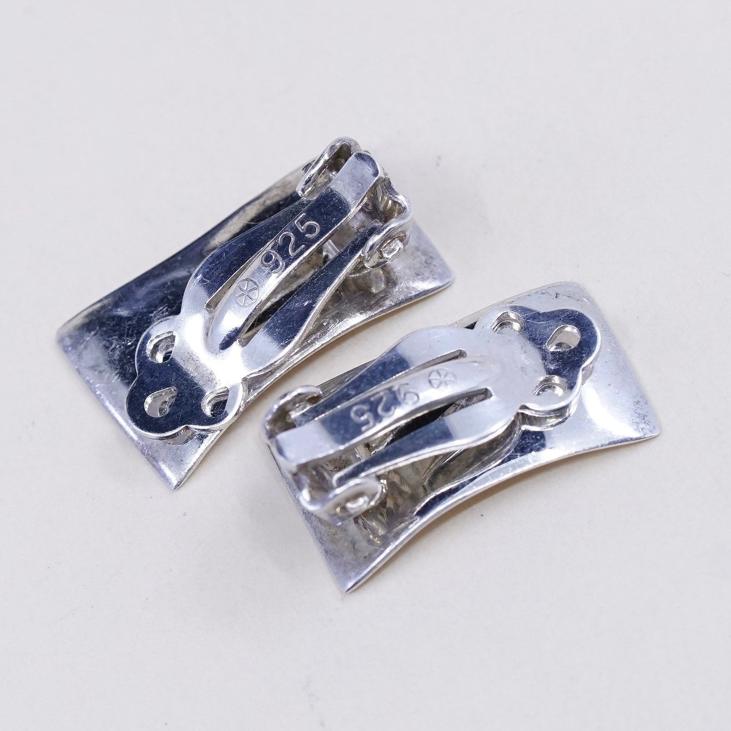 vtg Modern Sterling silver clip on, 925 inspiration earrings embossed “imagine”
