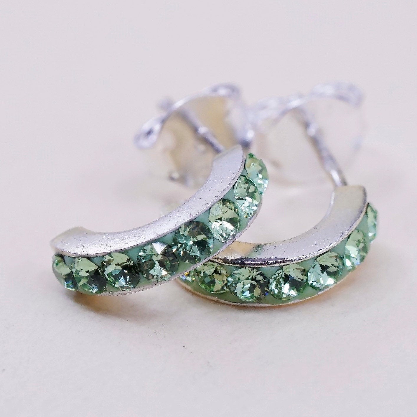 Vintage Sterling silver handmade earrings, 925 Huggie studs with green Cz