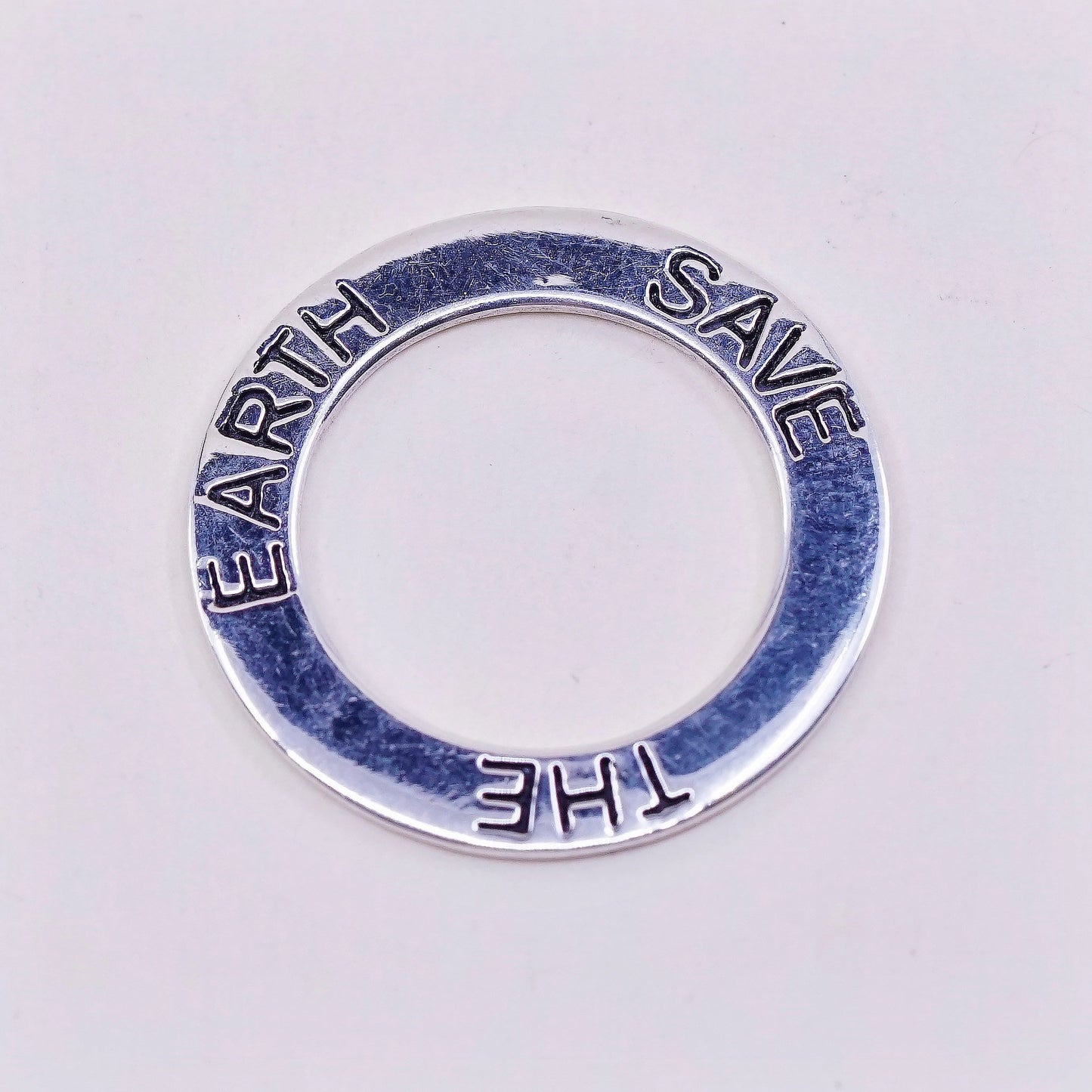 Vintage sterling silver handmade pendant, 925 circle embossed ”save the earth”