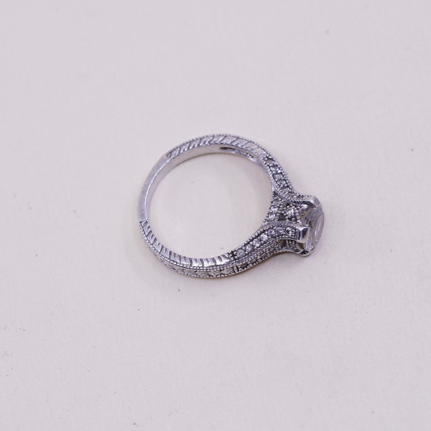 Size 7.75, vtg sterling 925 silver engagement ring with round CZ n cluster Cz