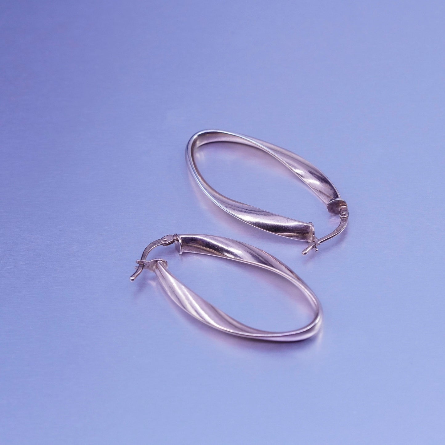 1.25”, vermeil rose gold Sterling silver handmade earrings, 925 twisted hoops