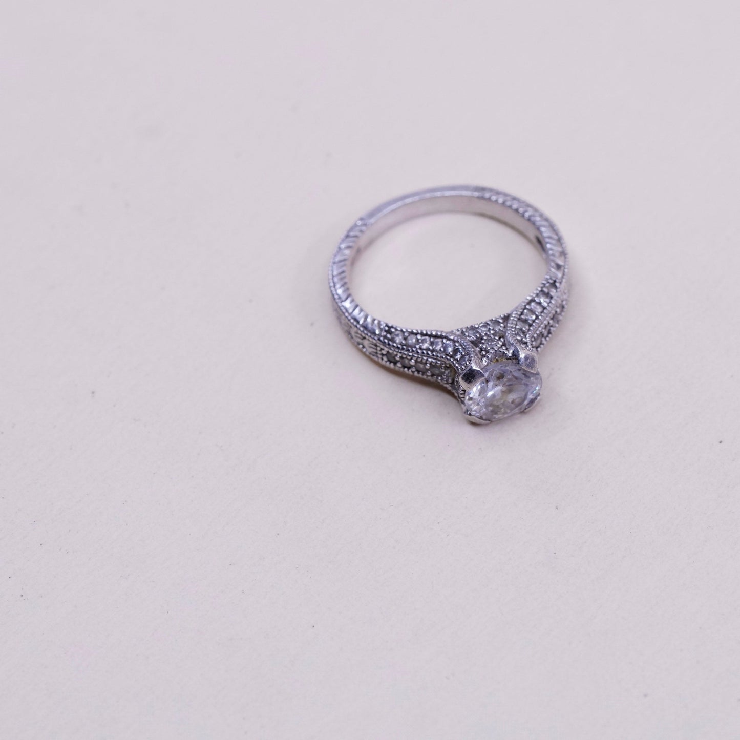 Size 7.75, vtg sterling 925 silver engagement ring with round CZ n cluster Cz