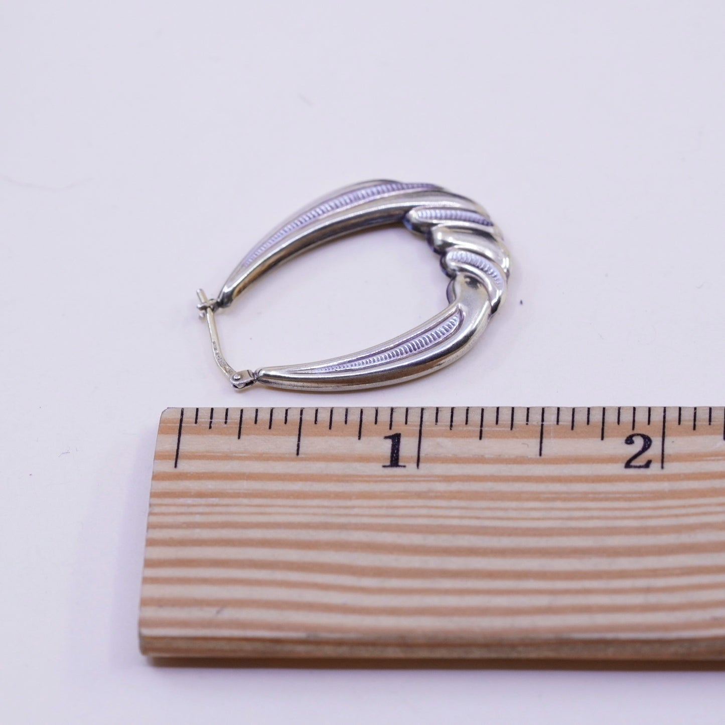 1.25”, two tone sterling silver loop earrings, Ribbed twisted hoops, huggie