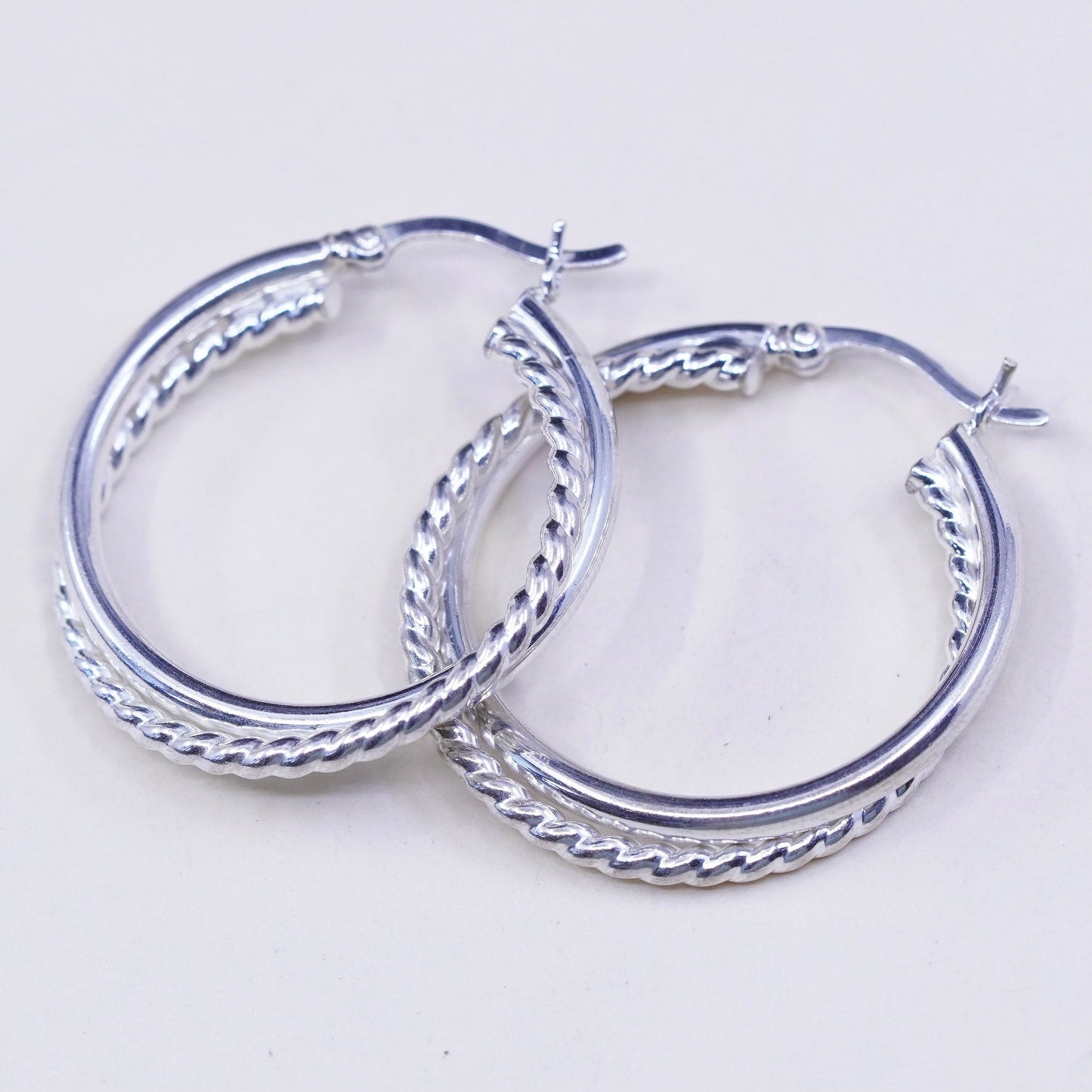 1.25”, Vintage sterling silver loop earrings, entwined twisted primitive hoops