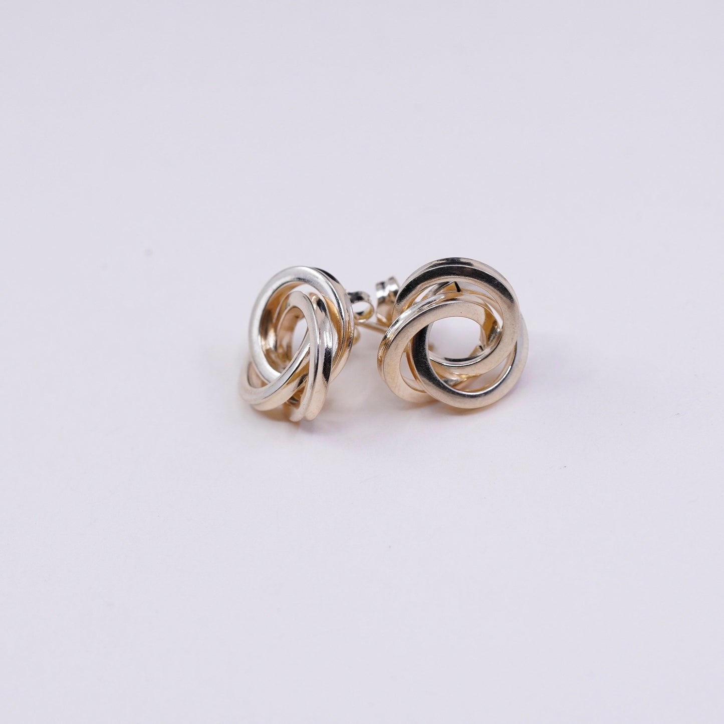 2.8g, vintage 14K yellow gold earrings, real gold edgy entwined circle studs , stamped 14K