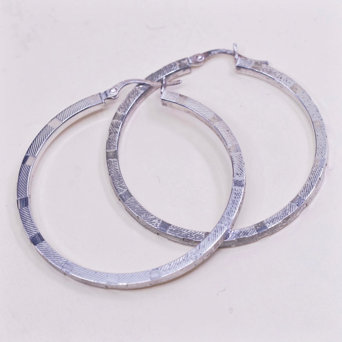 1.75”, vtg sterling silver loop earrings, textured minimalist primitive hoops