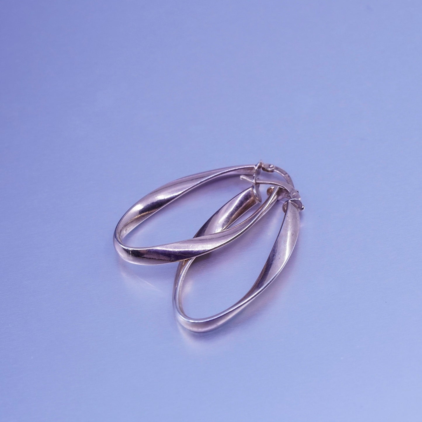 1.25”, vermeil rose gold Sterling silver handmade earrings, 925 twisted hoops