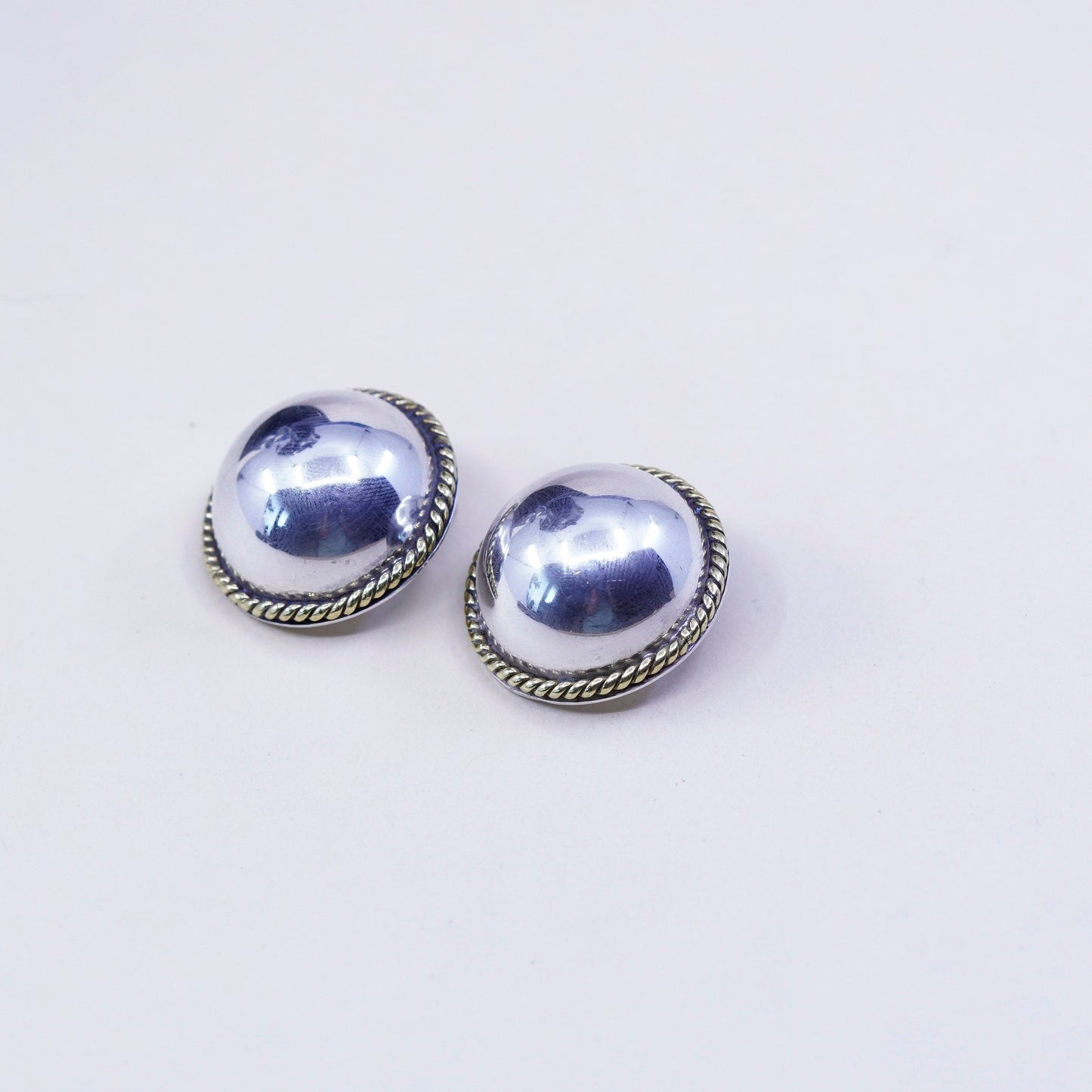 1”, vtg two tone Sterling 925 silver clip on earrings with brass cable around