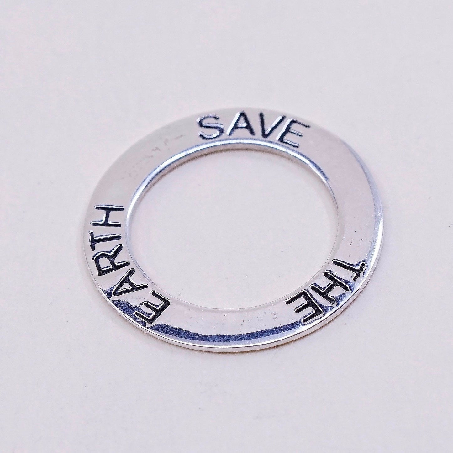 Vintage sterling silver handmade pendant, 925 circle embossed ”save the earth”