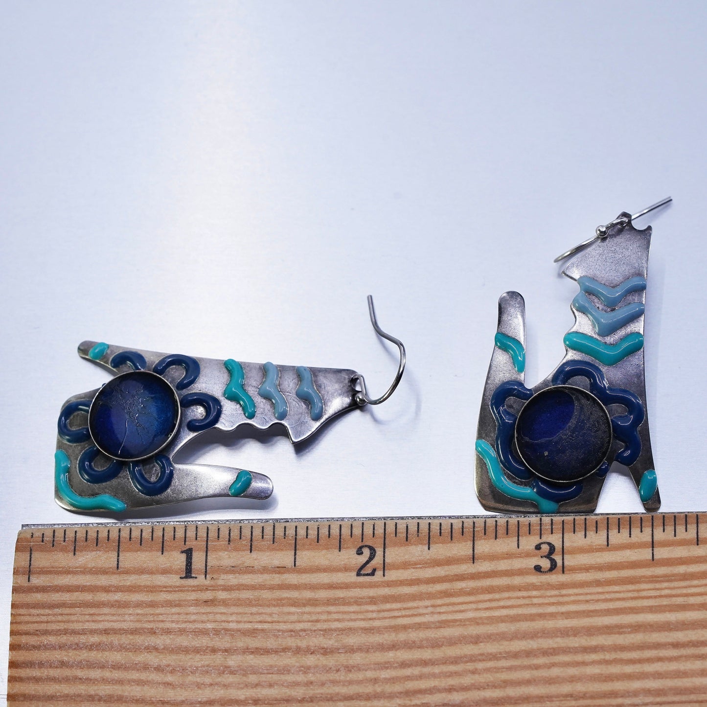 Vintage southwestern Sterling 925 silver wolf earrings with blue enamel inlay