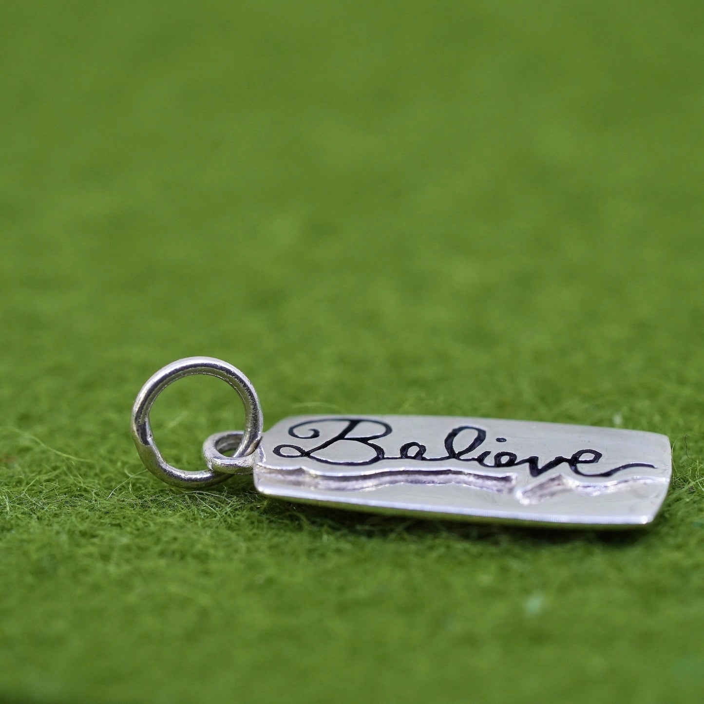 Vintage sterling silver charm, 925 silver tag with "believe" embossed