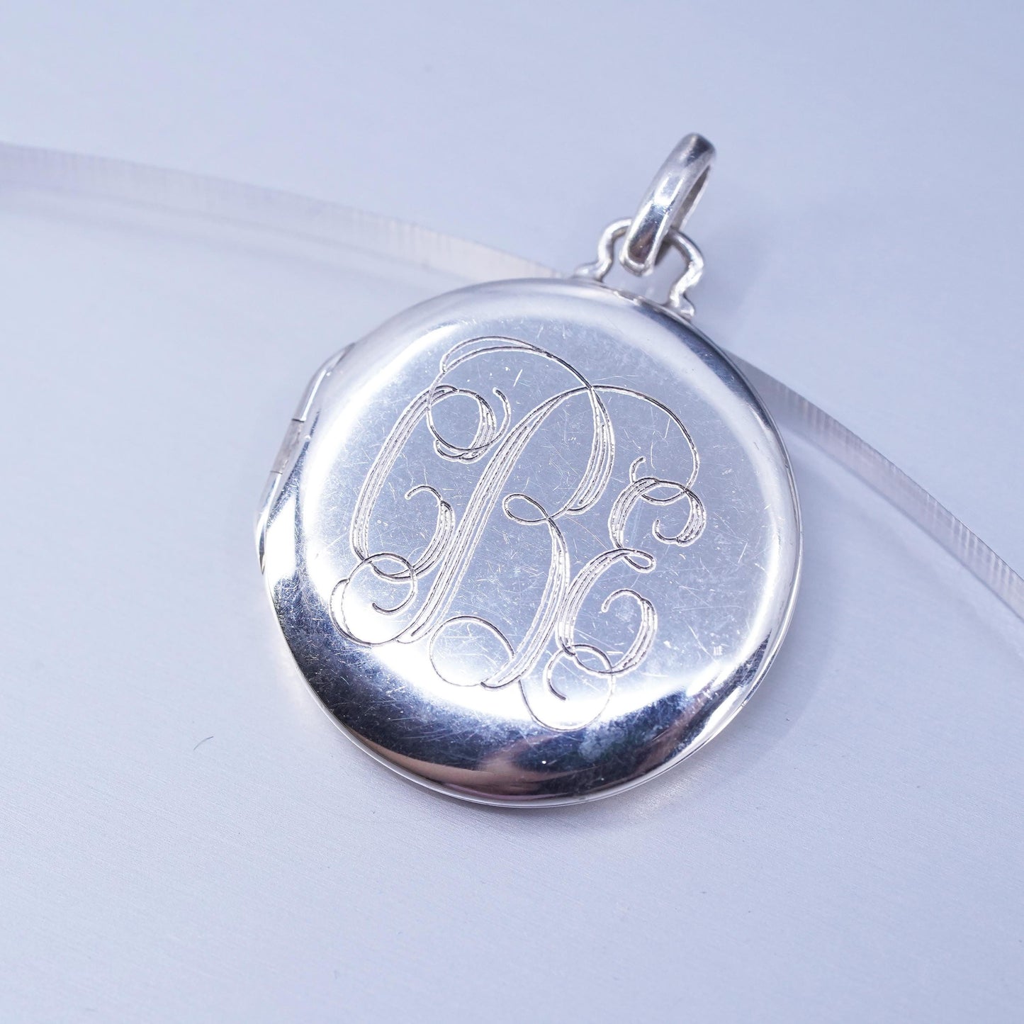 vintage Stella Dot Sterling 925 silver handmade circle monogram photo locket pendant engraved “CEB”, stamped 925 Stella Dot