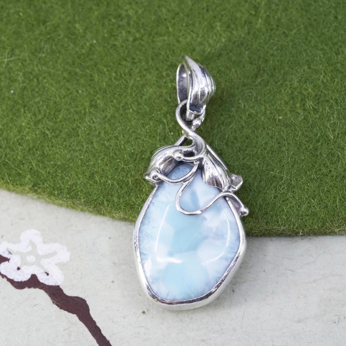 Vintage southwestern sterling 925 silver handmade pendant with Larimar leaves