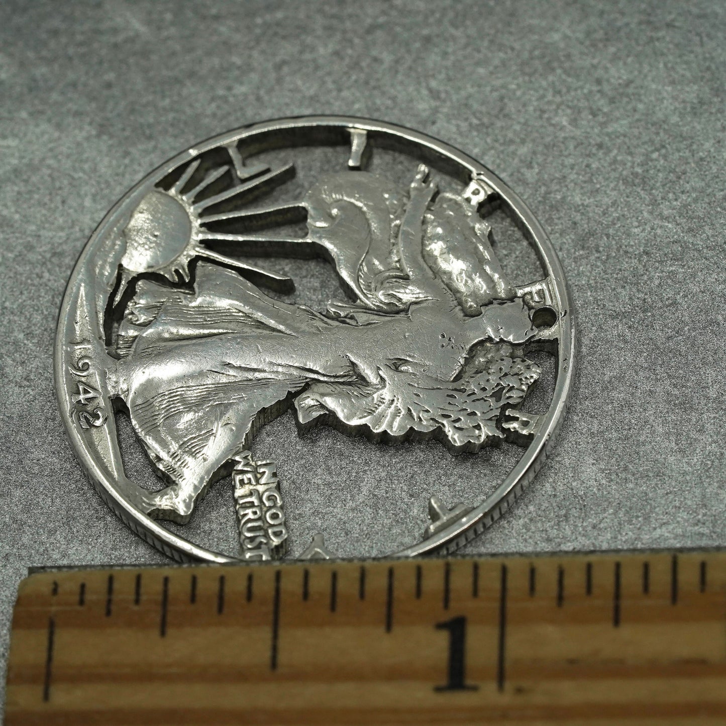 Antique 1942 900 silver half dollar coin pendant with walking liberty cutout