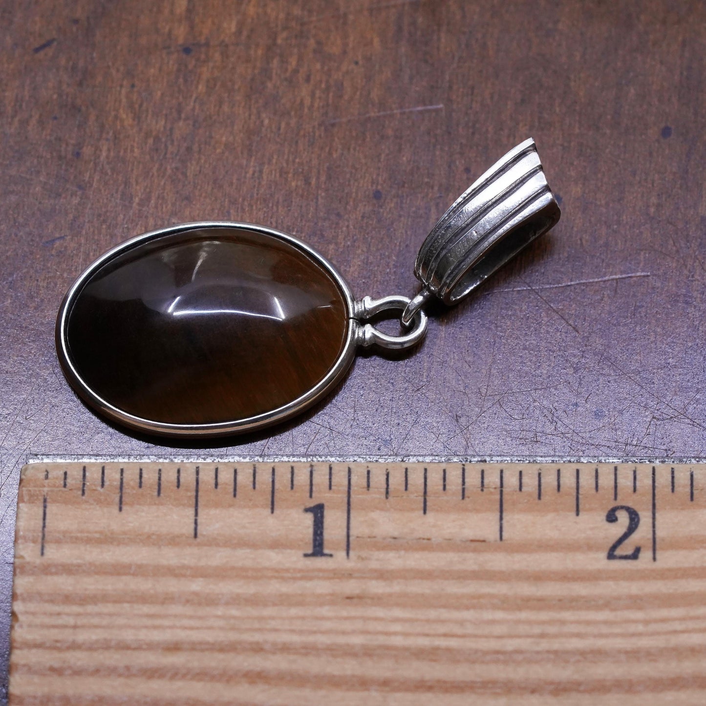 Vintage sterling silver handmade oval pendant with golden tiger eye