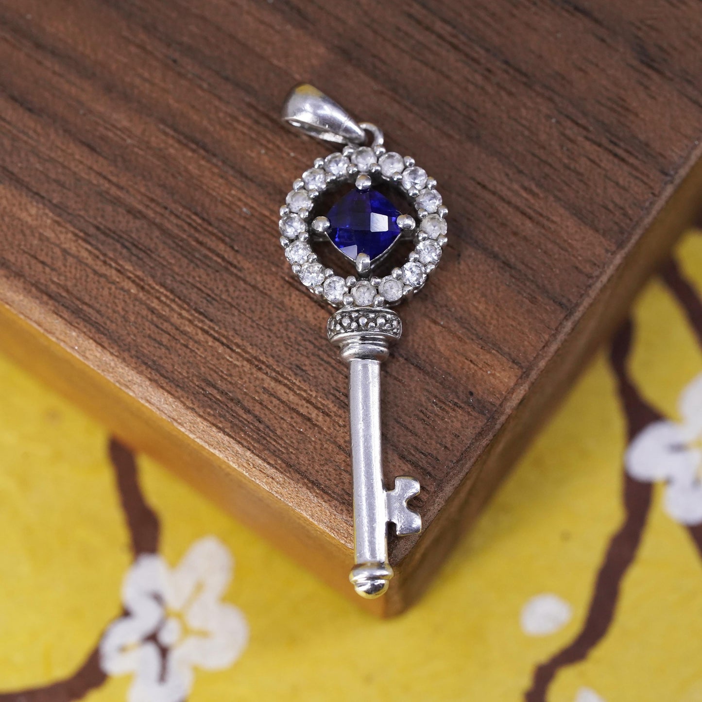 Vintage Sterling silver handmade pendant, 925 key with sapphire and Cz around