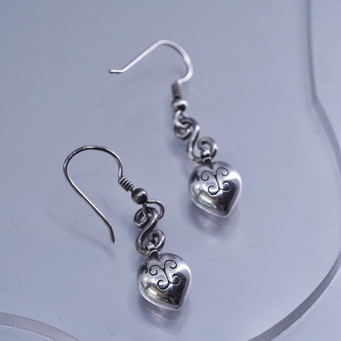 Vintage silver tone earrings with heart shaped cz