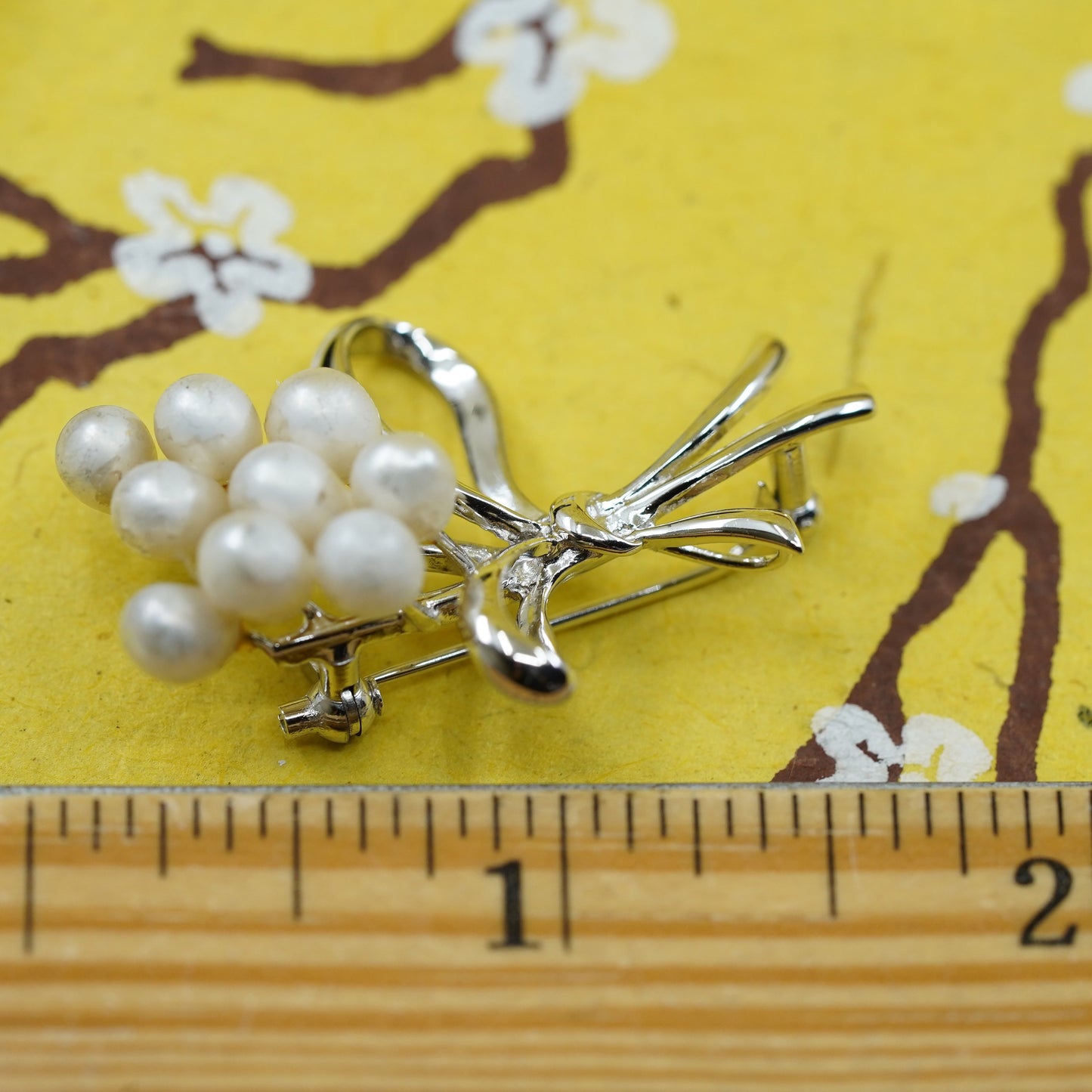 Vintage handmade sterling silver brooch, 925 flower with bobbin bow, faux pearl