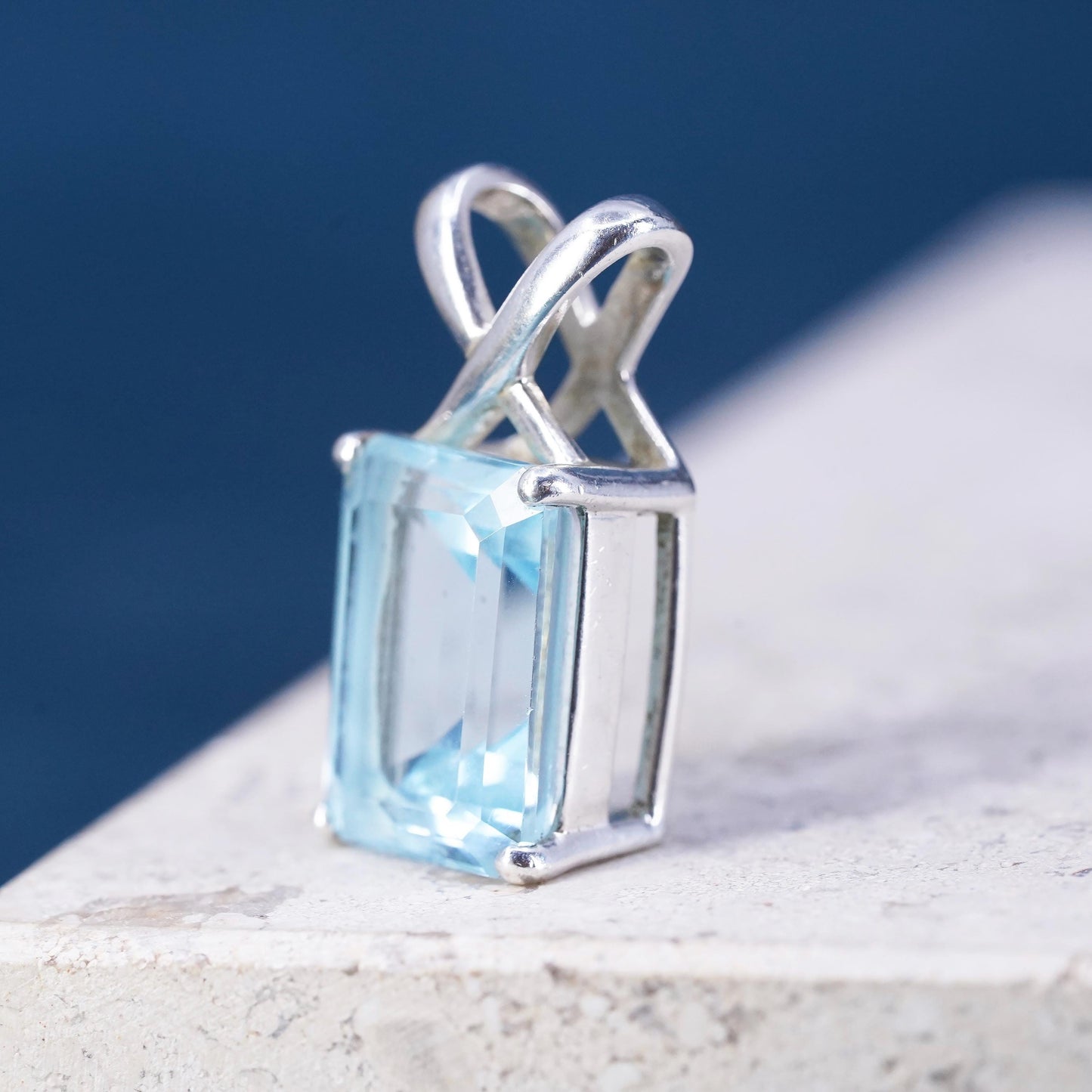 Vintage sterling 925 silver handmade pendant with emerald cut blue topaz