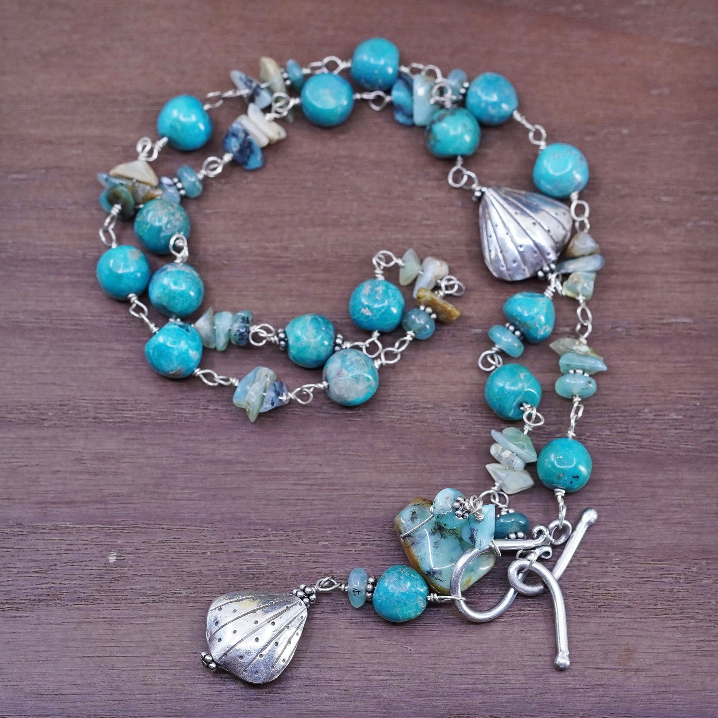 20”. Native American handmade necklace with turquoise beads and shell charms