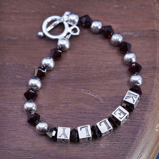 6.25”, sterling silver 925 bracelet with garnet beads and name “Kelly” cubes