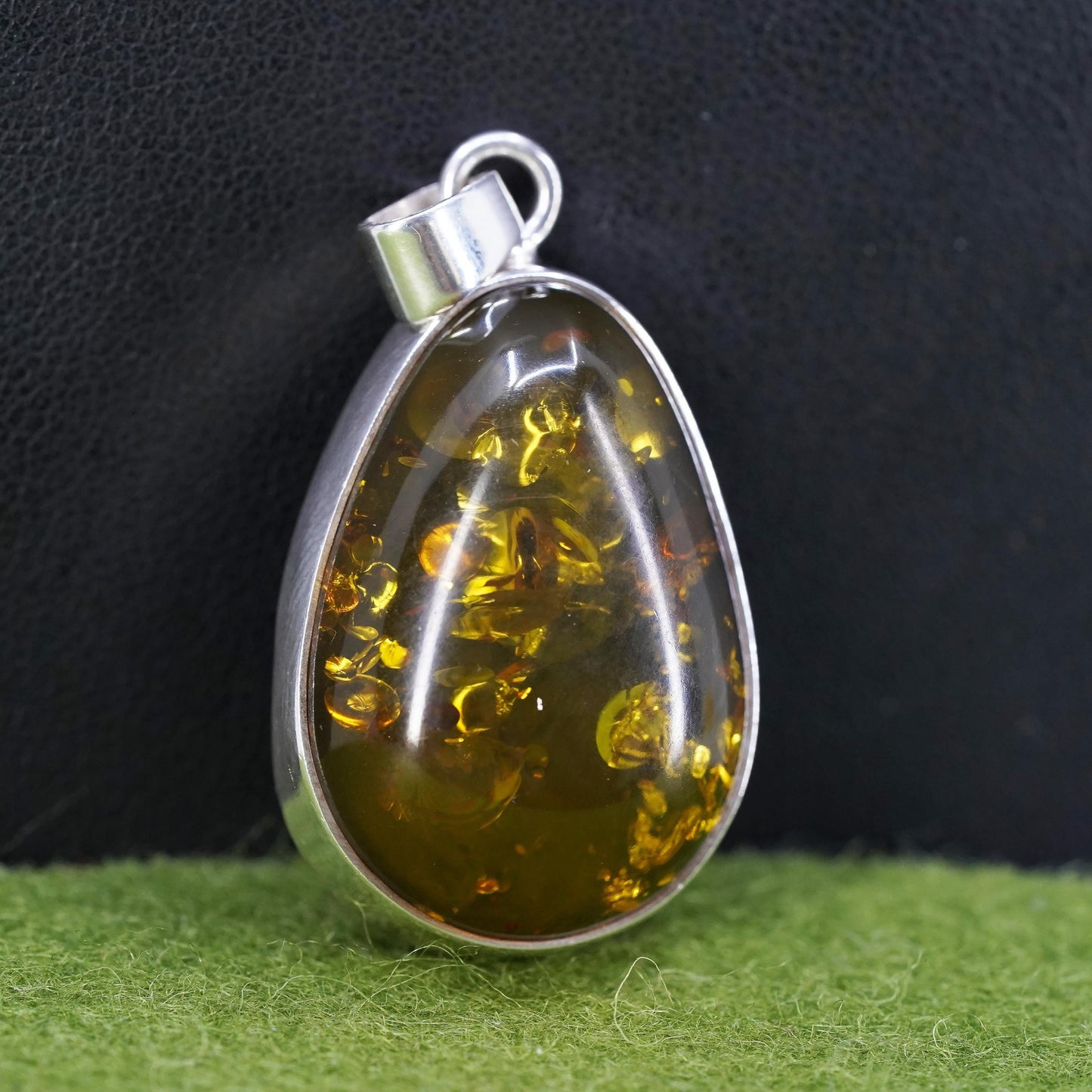 Vintage sterling 925 silver handmade pendant with teardrop amber