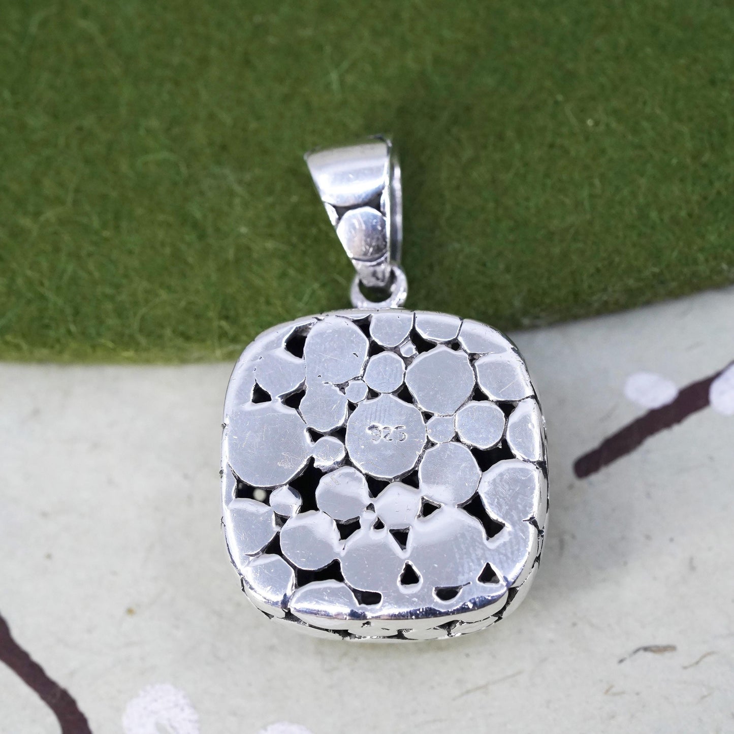 Sterling silver pendant, pebble textured 925 square with checkerboard cut onyx