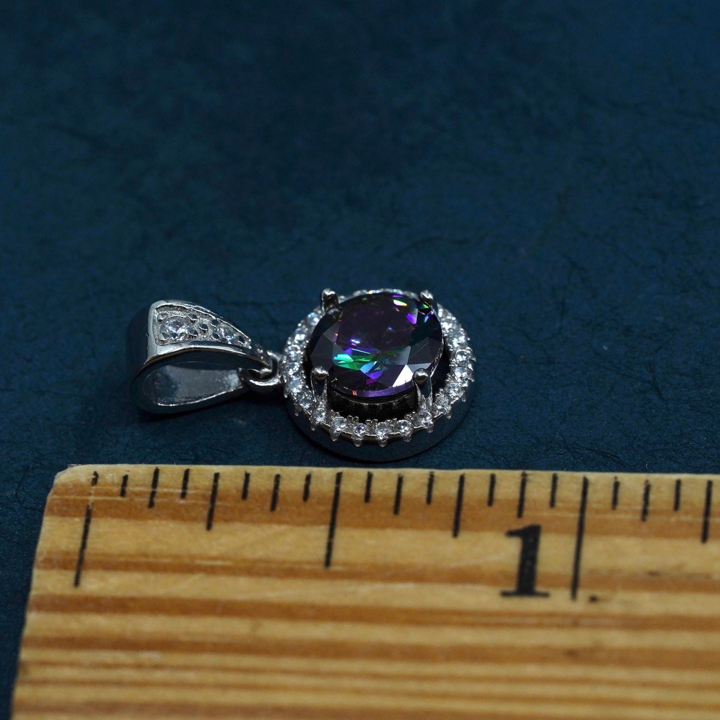 Vintage sterling 925 silver pendant with rainbow topaz and cz around