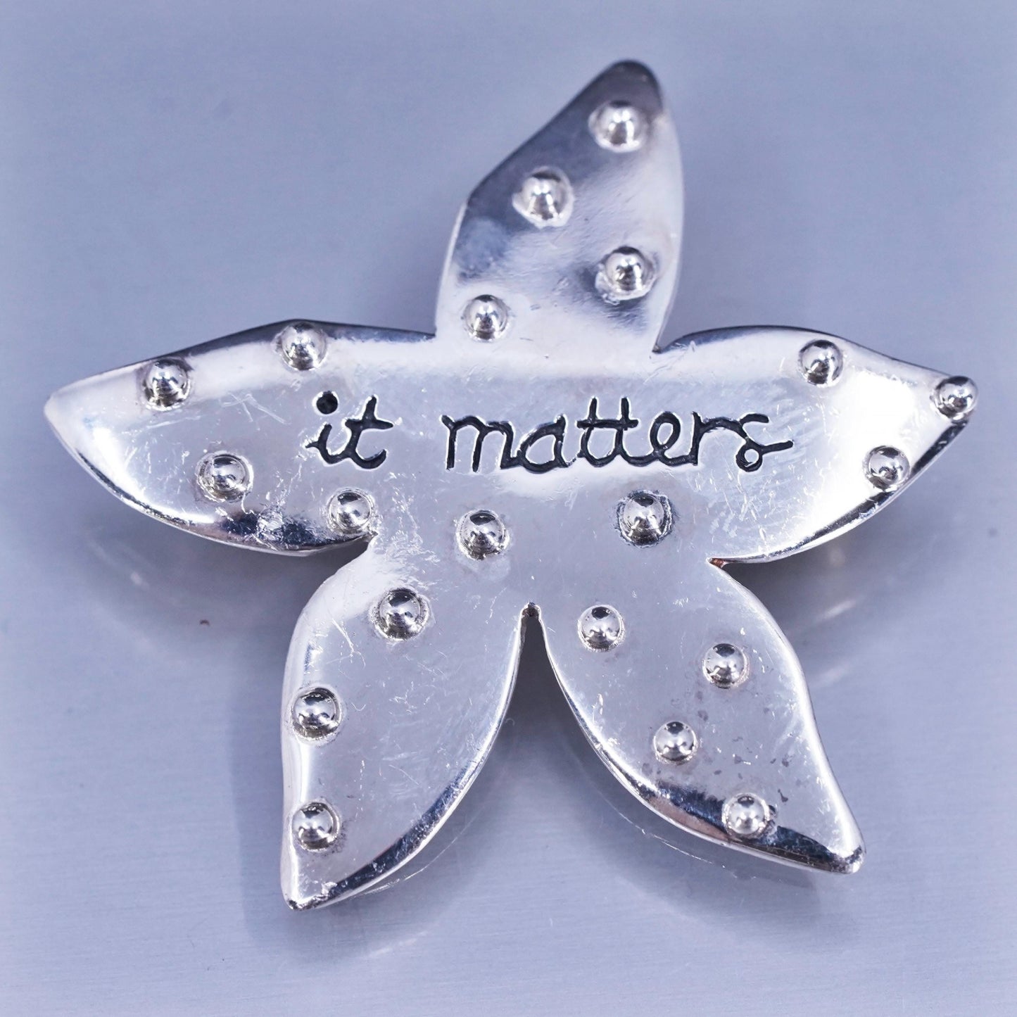 Baroni sterling silver brooch, 925 star starfish pin embossed “it matters”