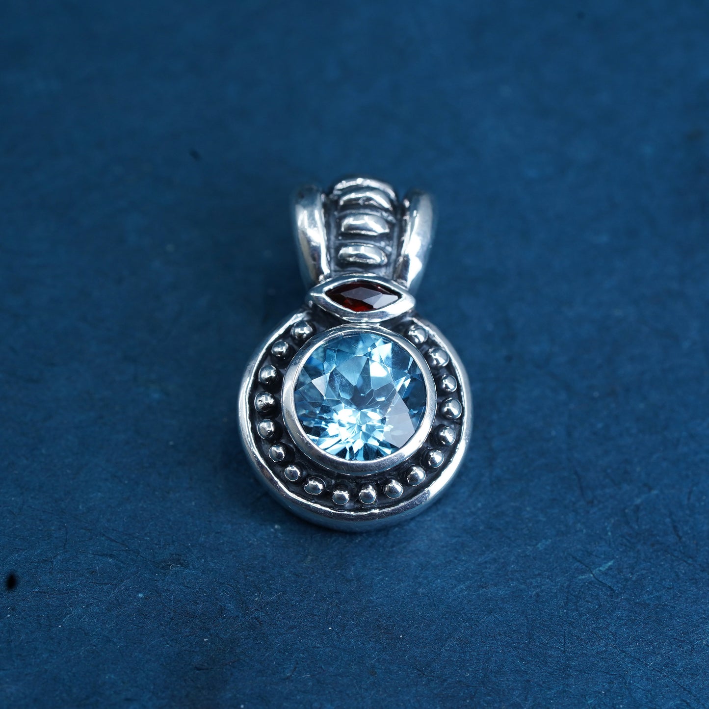 Vintage sterling silver 925 handmade pendant with blue topaz and garnet