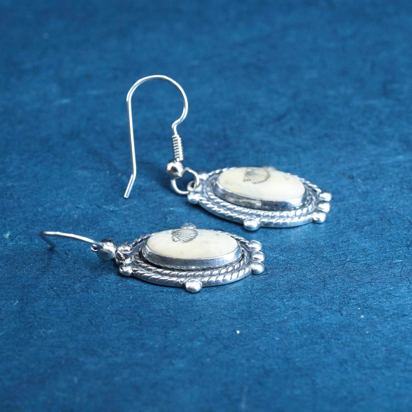 Vintage southwestern sterling silver handmade earrings with carved seed dangles