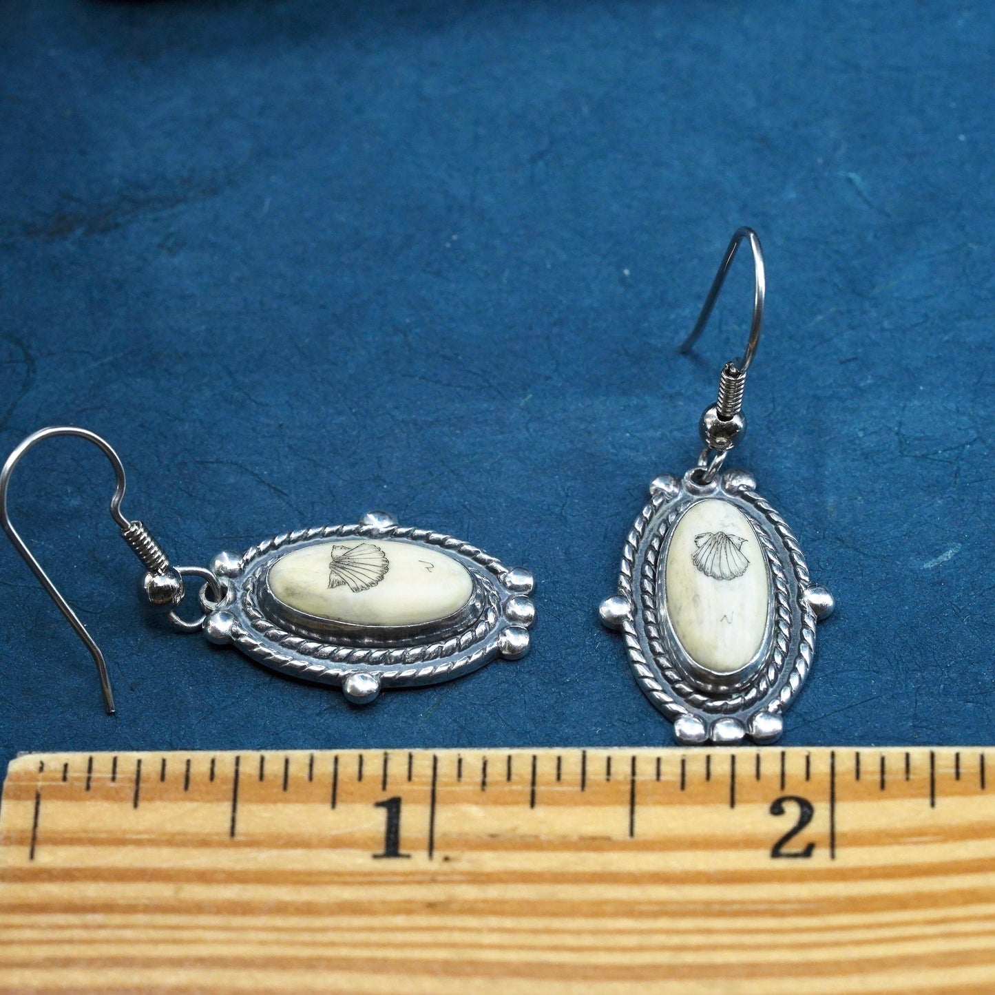 Vintage southwestern sterling silver handmade earrings with carved seed dangles