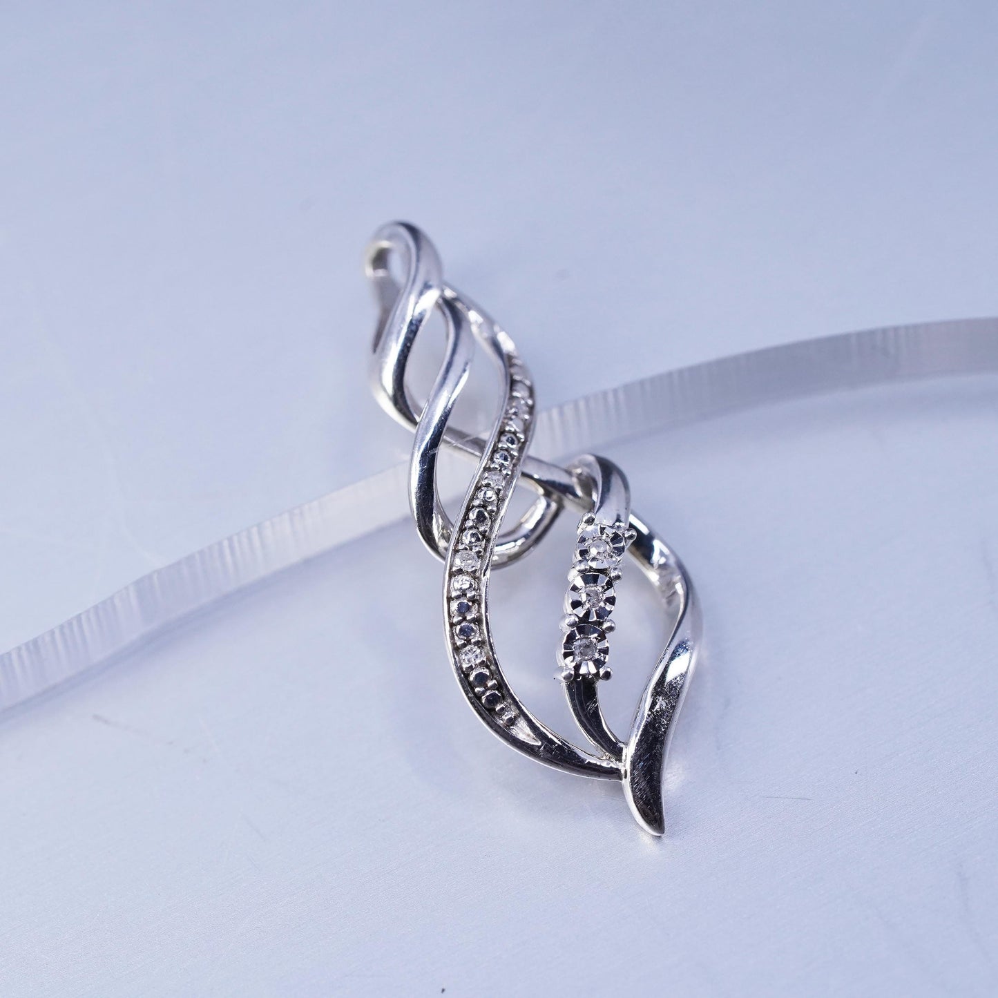 Vintage sterling 925 silver pendant, entwined teardrop with diamond