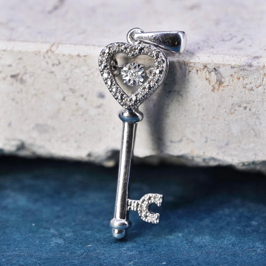 Vintage Sterling silver pendant, 925 heart key with dancing diamond