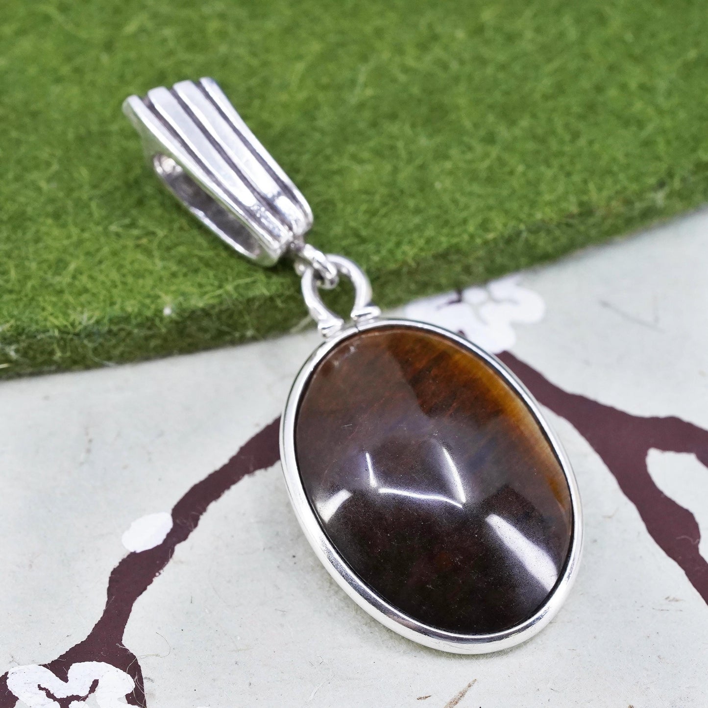 Vintage sterling silver handmade oval pendant with golden tiger eye