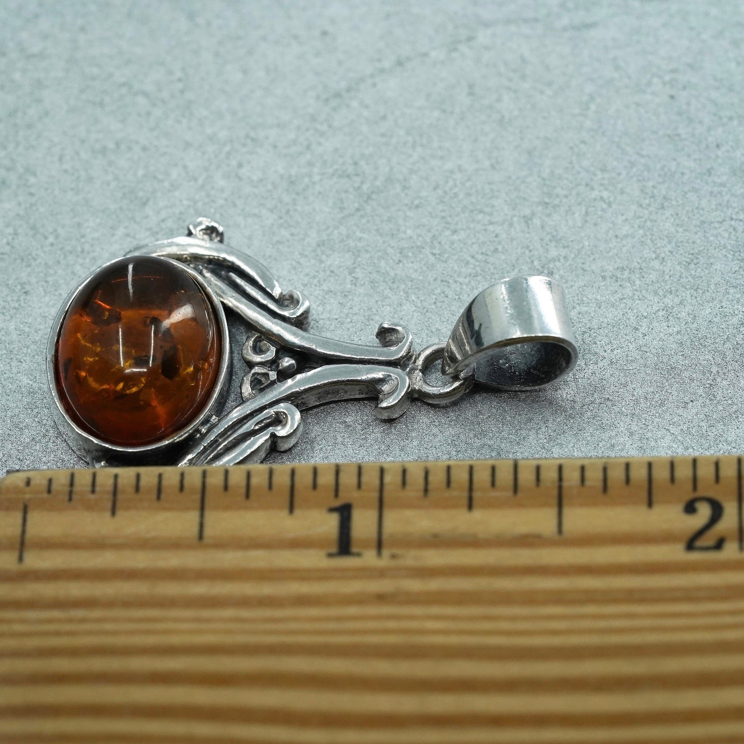 Vintage sterling 925 silver handmade pendant with oval amber