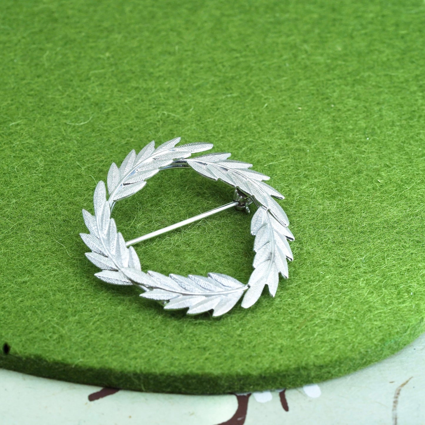 Vintage sterling silver handmade brooch, feather 925 circle, Christmas pin