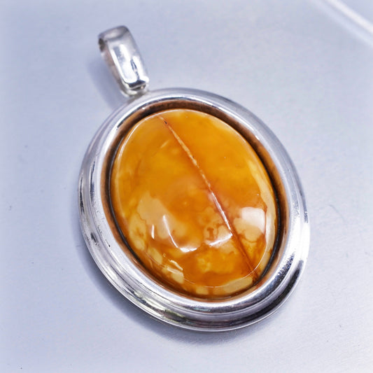 Vintage sterling 925 silver handmade pendant with oval amber