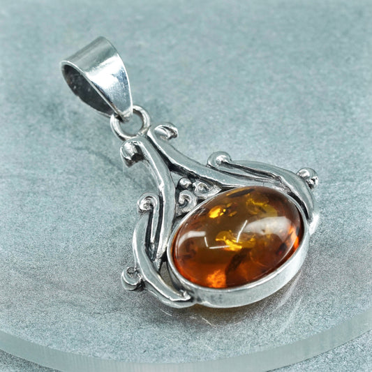 Vintage sterling 925 silver handmade pendant with oval amber