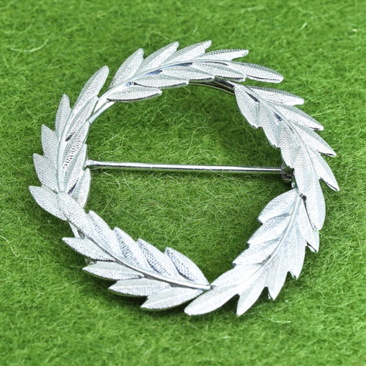 Vintage sterling silver handmade brooch, feather 925 circle, Christmas pin