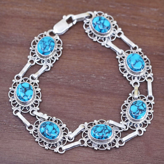 7.75”, mexico Sterling 925 silver filigree bracelet with spiderwebbed turquoise