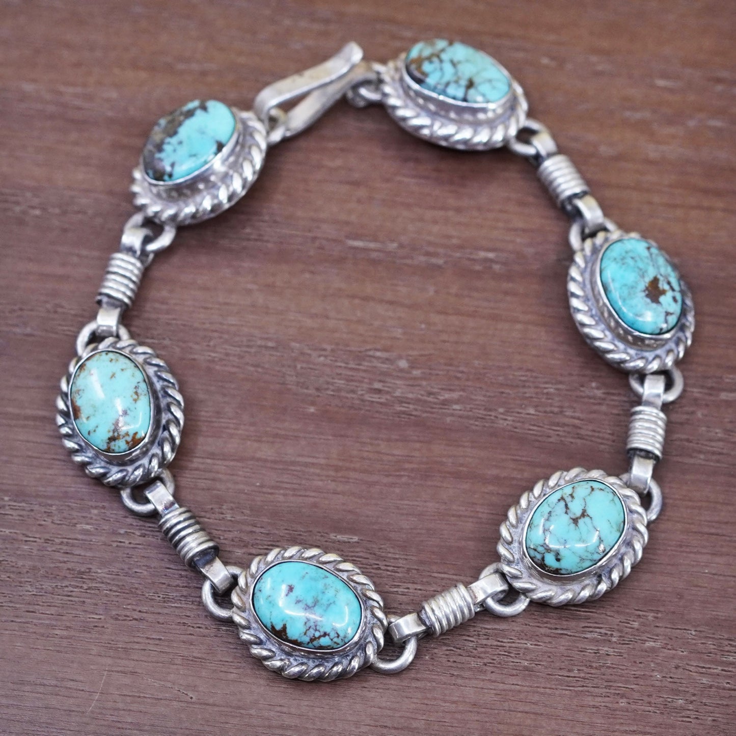 7.5”, southwestern Sterling 925 silver bracelet spiderwebbed turquoise cable