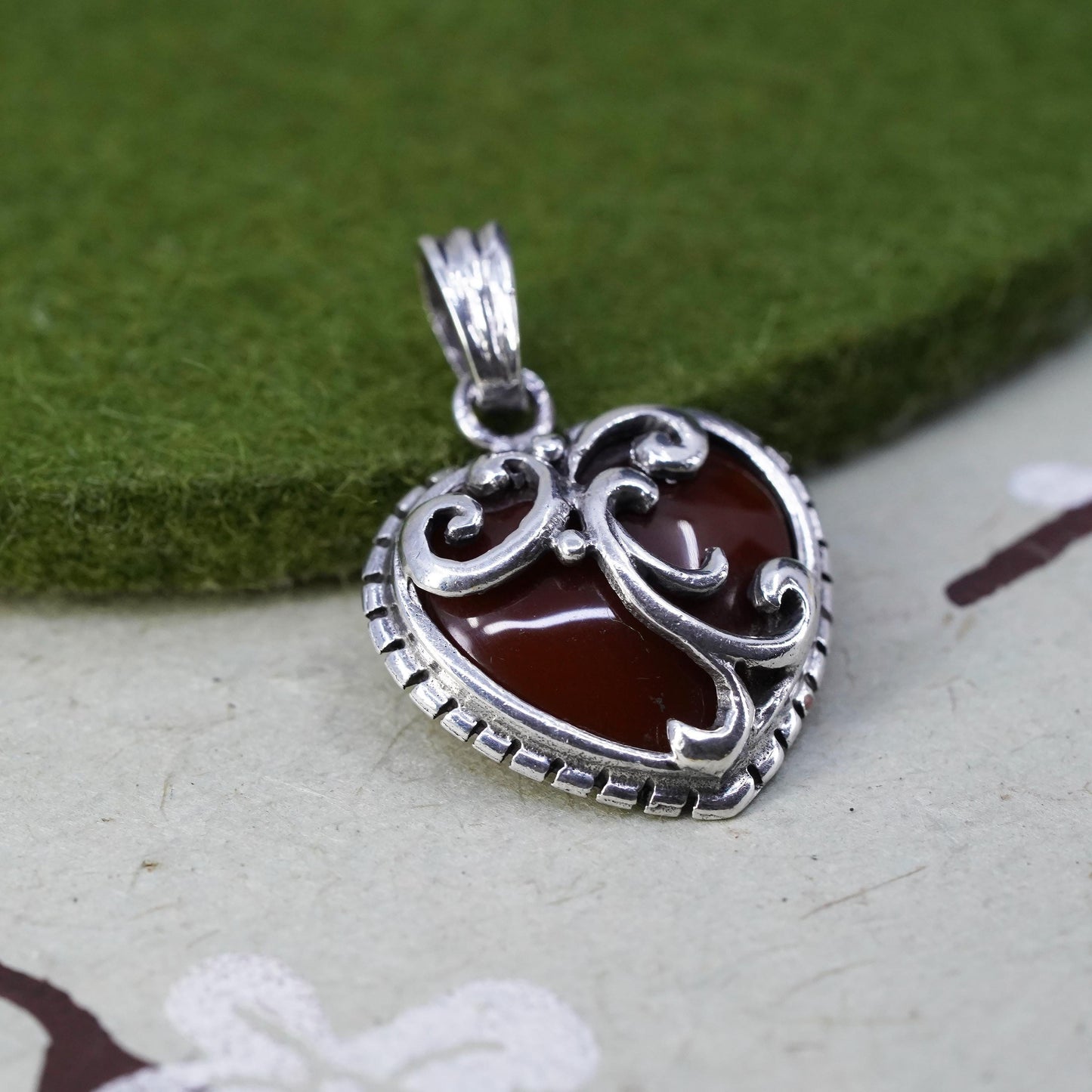 southwestern sterling silver 925 heart pendant with carnelian swirly details