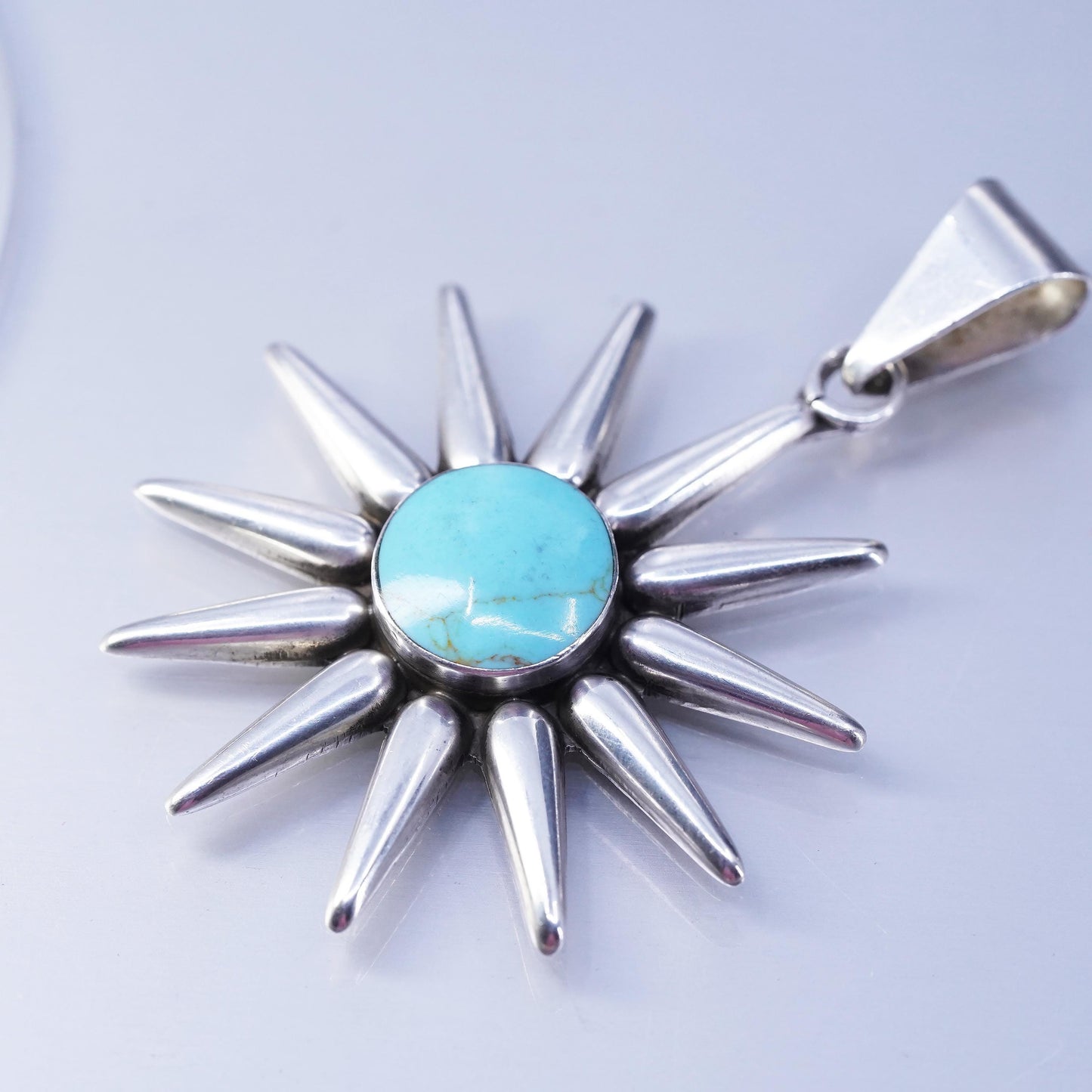 Vintage southwestern Mexican sterling 925 silver sun pendant with turquoise