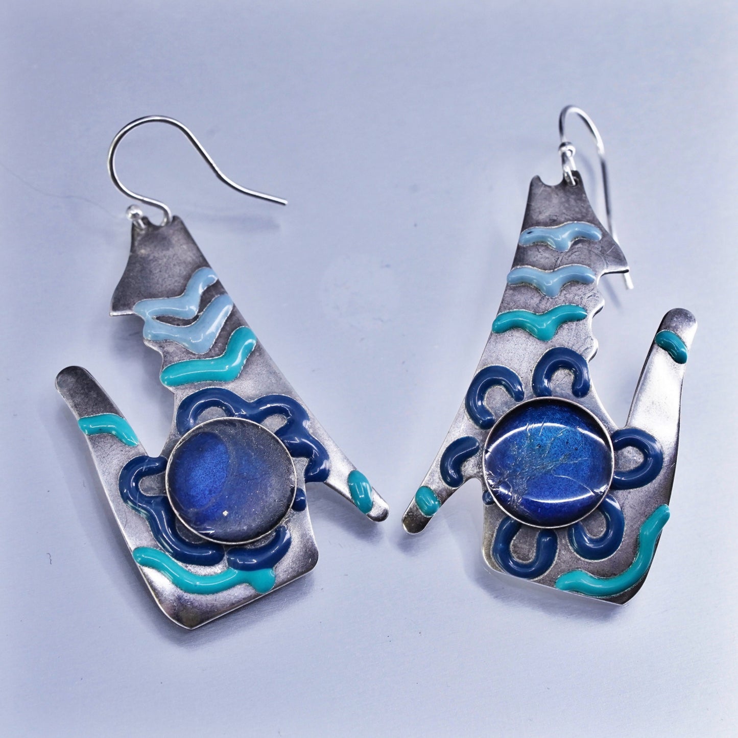 Vintage southwestern Sterling 925 silver wolf earrings with blue enamel inlay