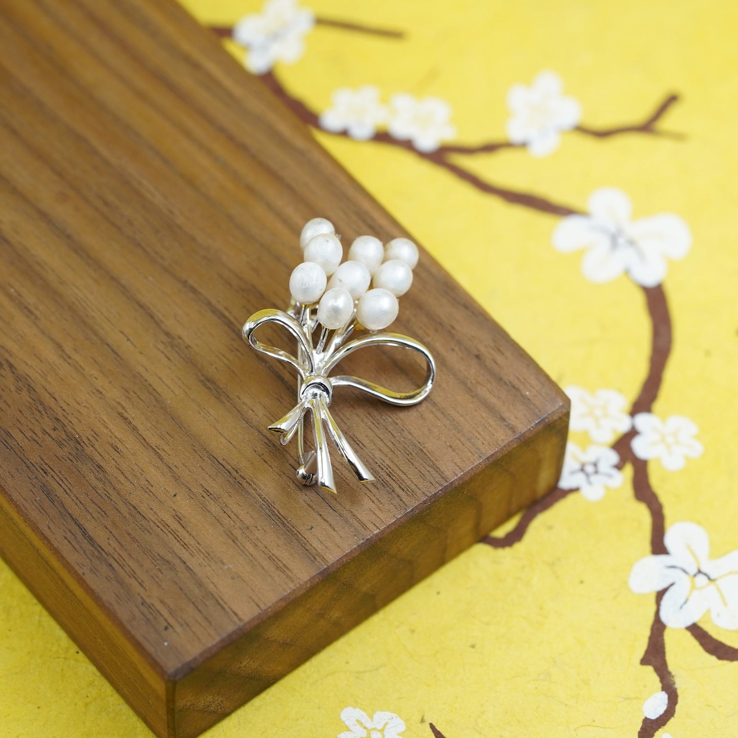 Vintage handmade sterling silver brooch, 925 flower with bobbin bow, faux pearl